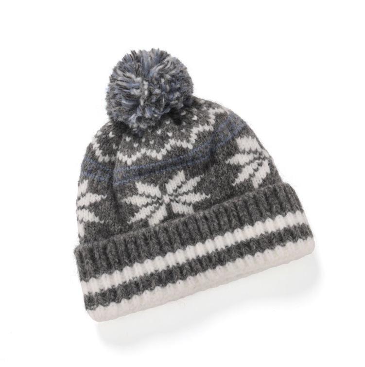2025 Women's Retro Snowflake Wool Knitted Hat with Fleece-Lined Ear Protection