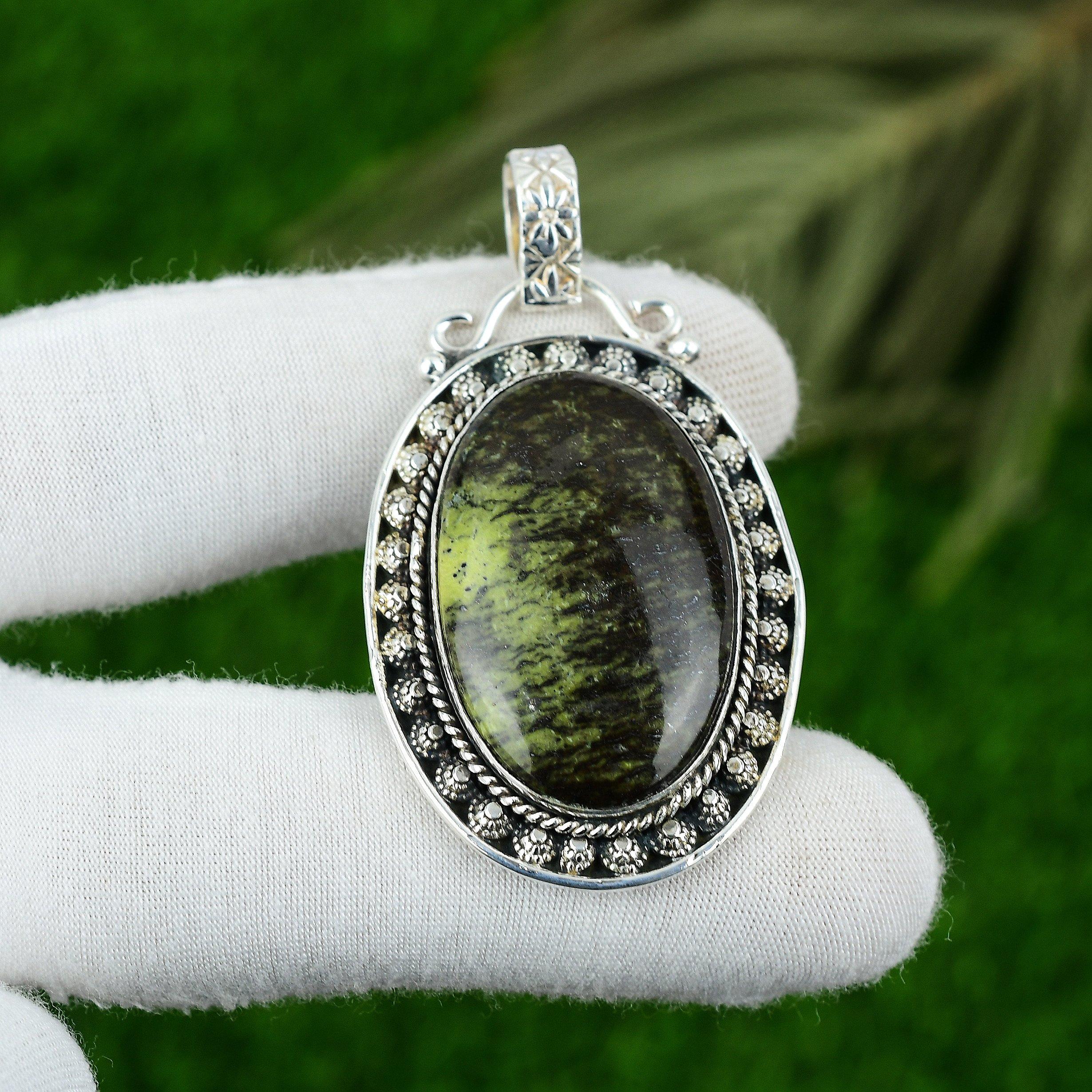 

Oval Natural Gogunjula Sterling Silver Anniversary Bezel Sister Art Deco Pendant