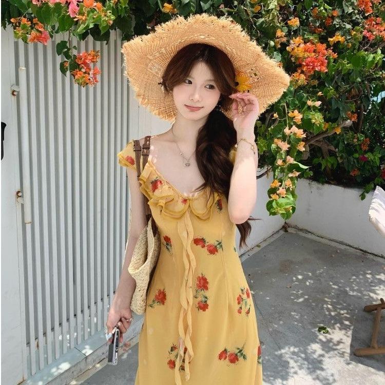 Seaside vacation style temperament waist beautiful long dress women's summer new French coffee break yellow floral dress