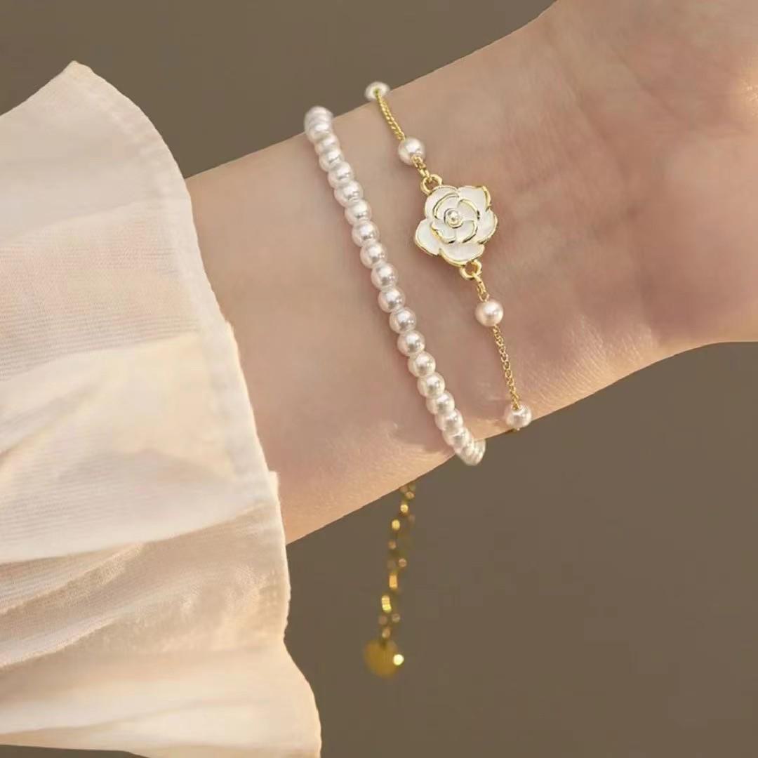 

Элегантный двухслойный браслет и кольцо из жемчуга «Камелия»: Универсальные, высококачественные аксессуары для женщин Double Camellia Pearl Bracelet