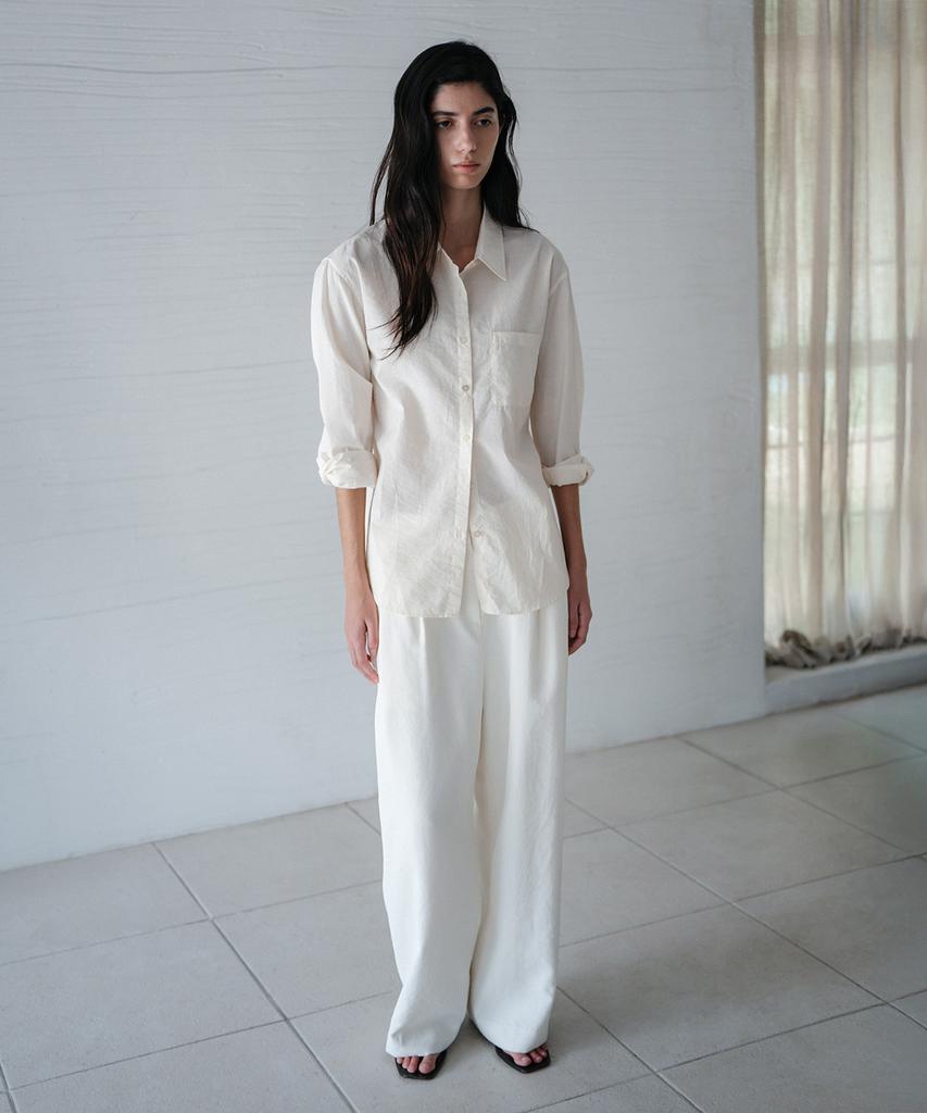 Beullaengkeulumumeon Sway Two-Pleat Pants_Ecru