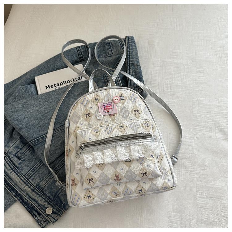 Schoolbag high-end sense large-capacity cartoon backpack bag female 1011 new travel backpack college student class schoolbag