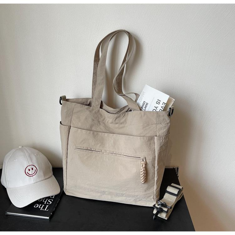 

Fashion tote bag women s personality trend portable shoulder bag 2025 new simple solid color large capacity messenger bag хакі