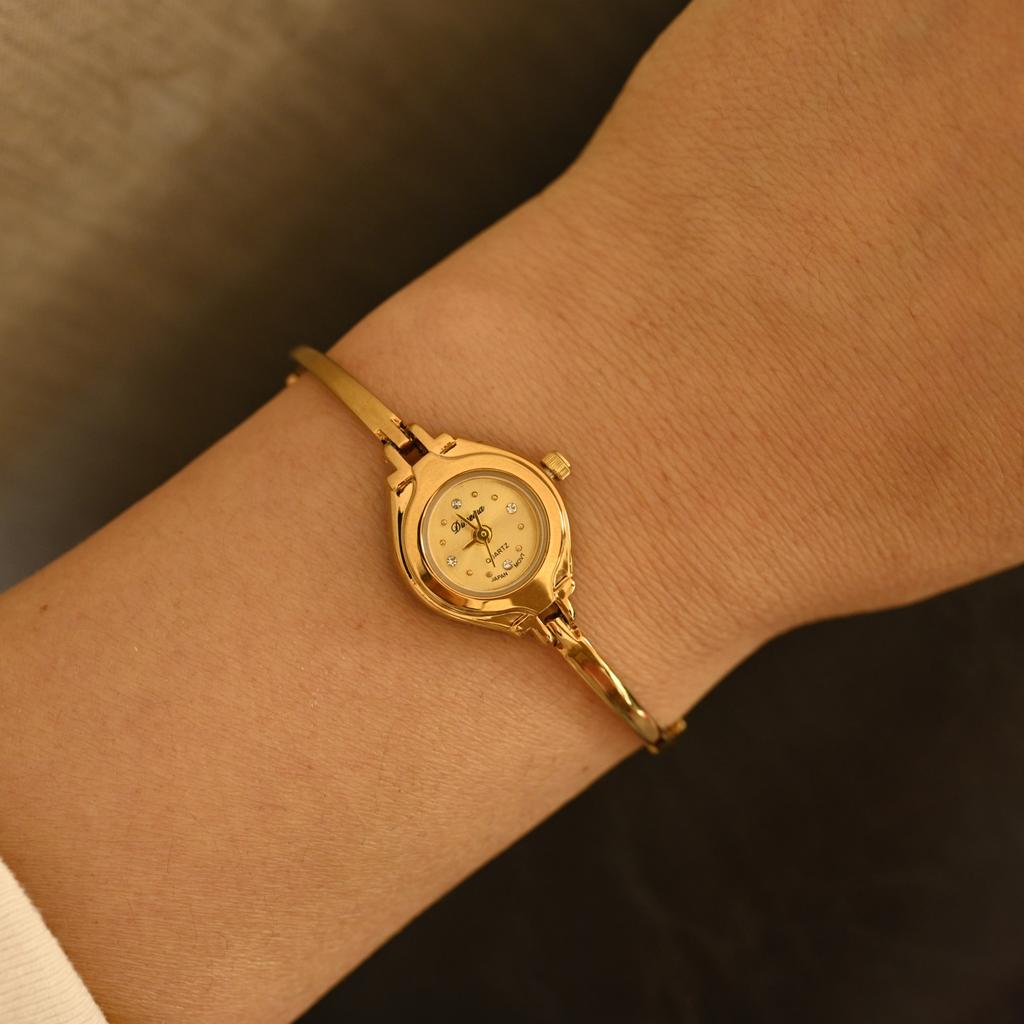 New Women Light Luxury Quartz Watch Round Small Dial Thin Strap Gold Bangle Style Timepiece