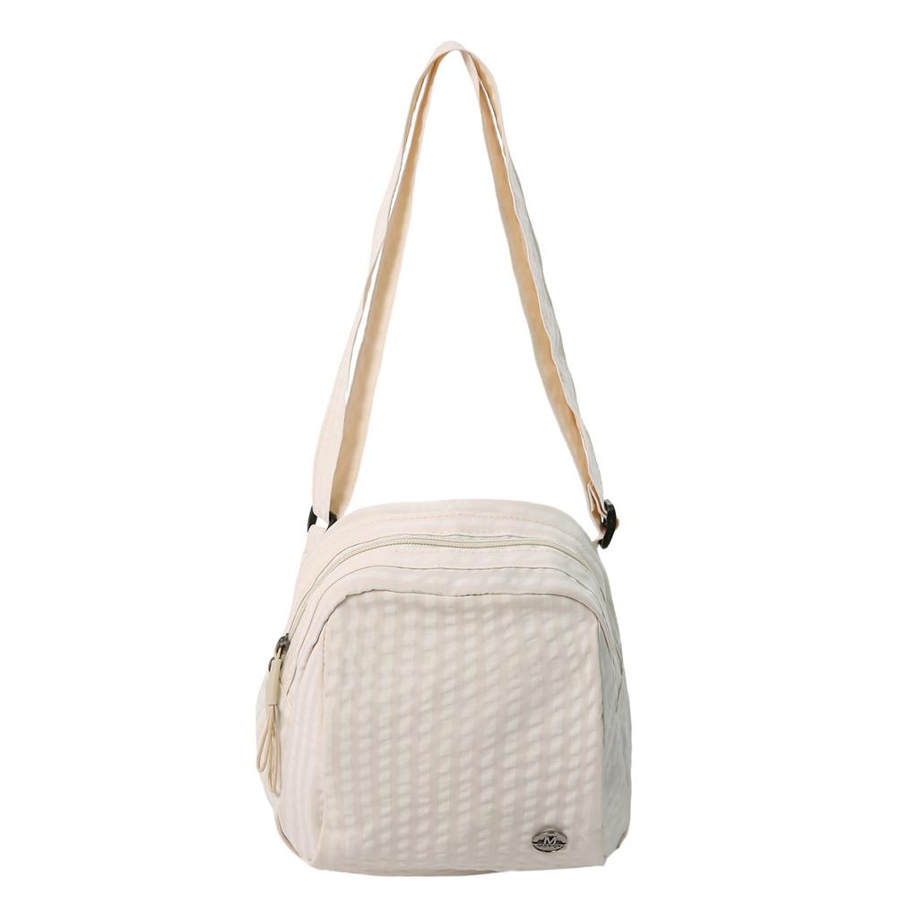 Autumn and winter versatile nylon cloth shell bag women's and women's travel backpack casual zipper messenger bag