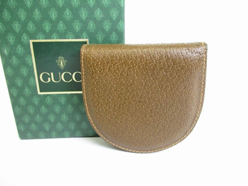 

Автентичний вінтажний гаманець GUCCI з оливкової шкіри №8322, відремонтований
