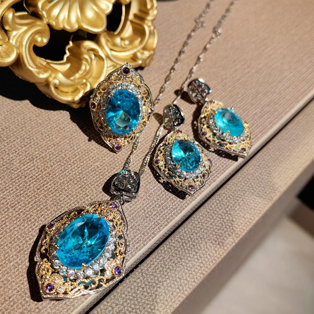 2026 Court Style Two-color Gold Hollow Craft Inlaid Pink Diamond Pendant Royal Blue Stud Earrings Colored Treasure Ring Set