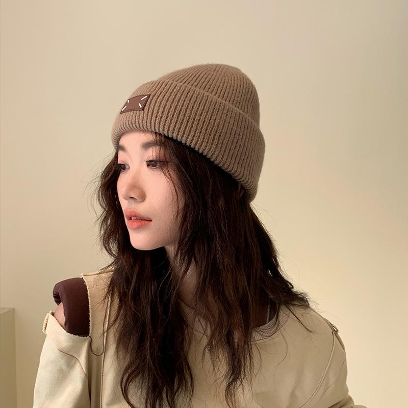 Winter new thick wool knitted hat warm versatile bag head hat flanged ear protection fashion wool hat women's cold hat