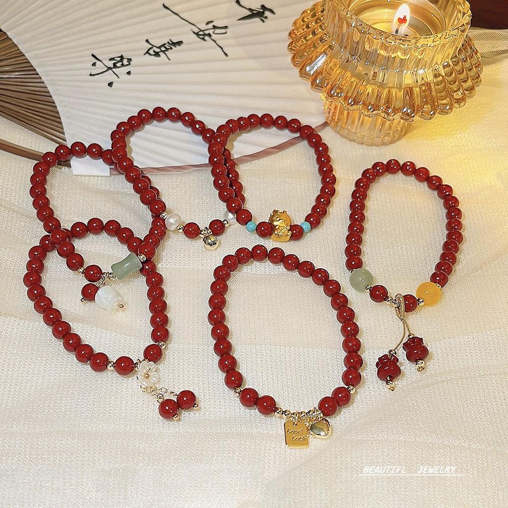 New design rock crystal elastic bracelet sweet temperament strawberry crystal bracelet jewelry girl.