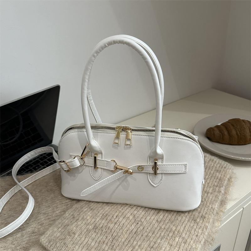 Simple niche portable commuter bag women's new fashionable retro underarm bag simple large-capacity messenger bag