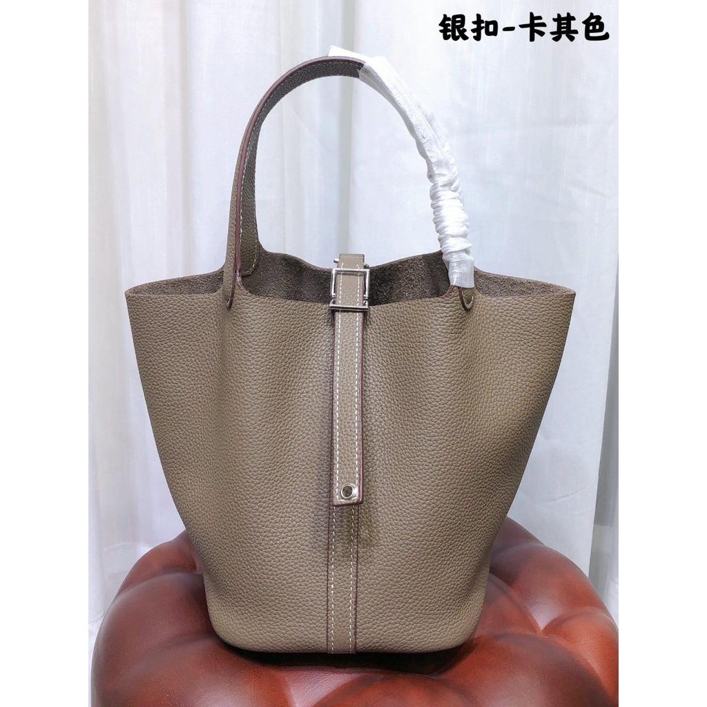 Spot wholesale top layer cowhide vegetable basket bag leather bucket bag commuter fashion lock buckle hand-held handbag woman