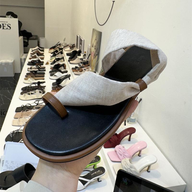 Korean Version of Niche Design Sense Leopard Print Cover Toe Flat Bottom Slippers Women's Outer Wear Summer New Fashion Beach Vacation Sandals