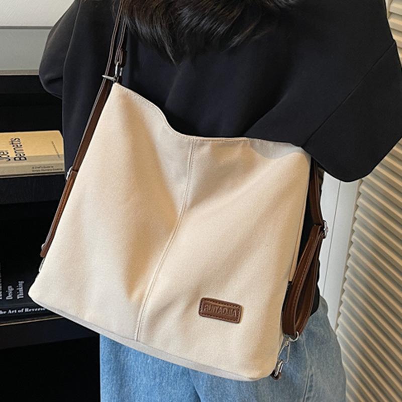 Sac femme nouveau grande capacité sac à dos de trajet sac bandoulière sac décontracté multi-port pour sortir