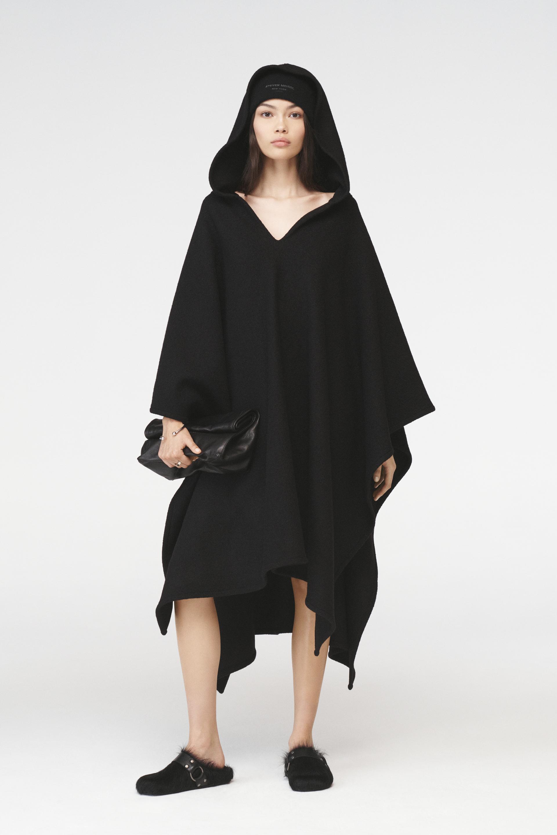 

STEVEN MEISEL LEATHER CLUTCH BAG