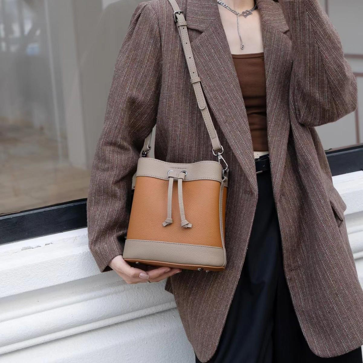 

Сумка-ведро кроссбоди на одно плечо практичная кожаная модная женственная с высоким чувством стиля