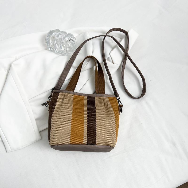 Canvas-Tasche mit großem Fassungsvermögen, gestreift, Damen, Sommer 2025, neue trendige Mode, tragbare Tragetasche, Pendler-Umhängetasche