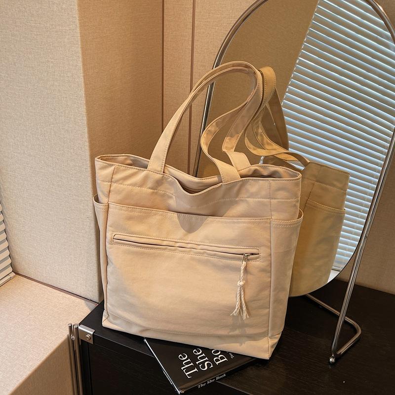 New Large-capacity Business Commuting Fashion New Large-capacity Soft Surface Solid Color Canvas Shoulder Bag