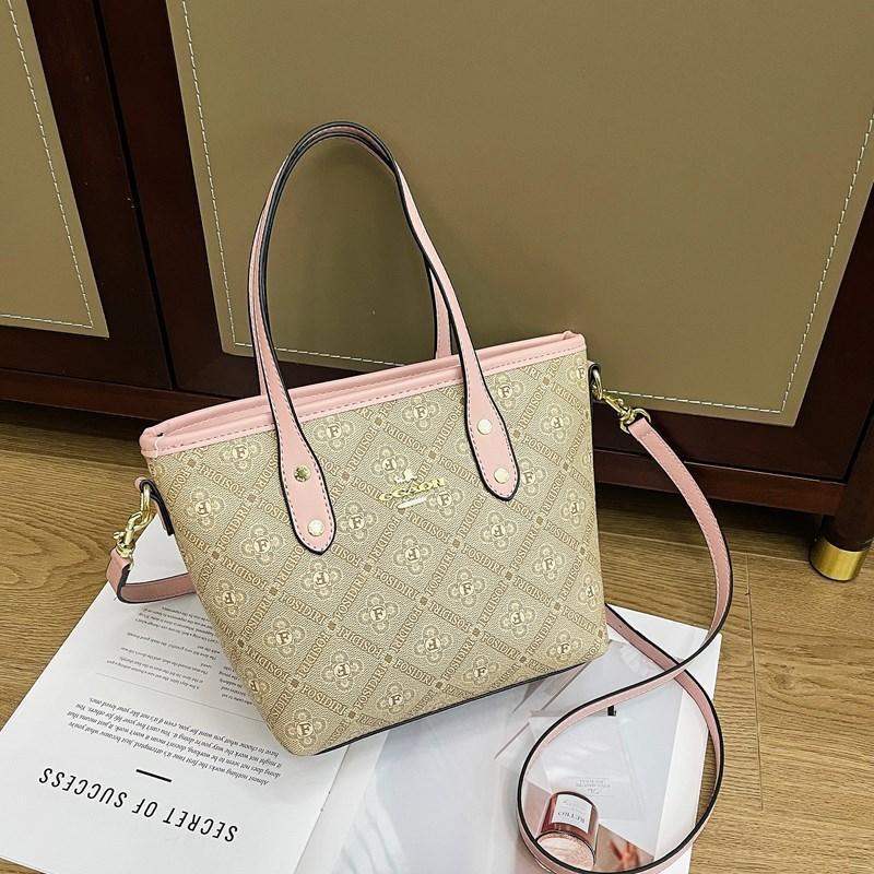 

New high-end fashion light luxury contrasting color tote bag portable shoulder women s bag рожевий
