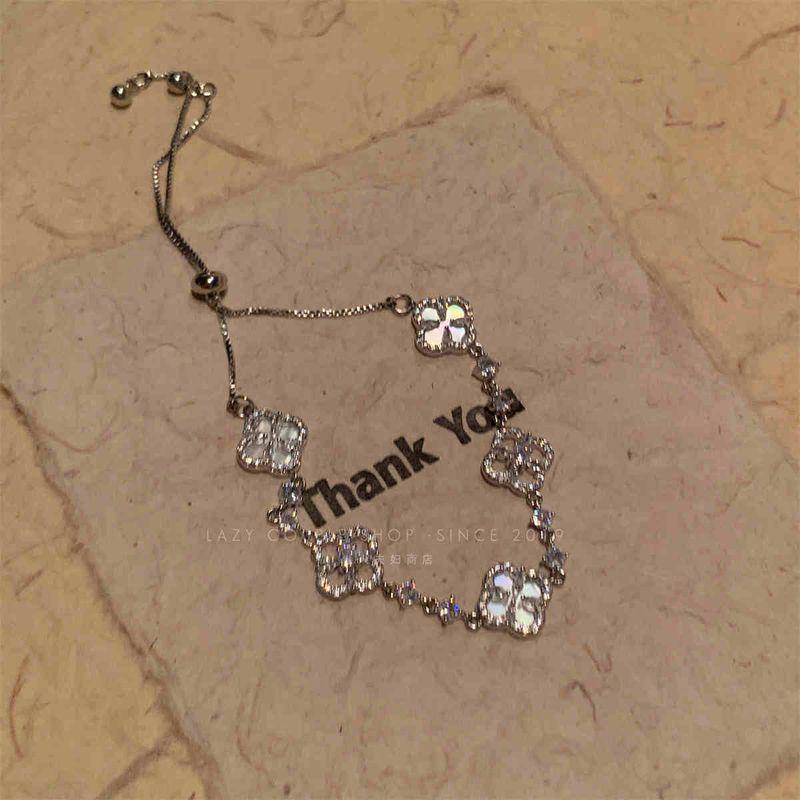 

Браслет-пуловер с клевером, ракушкой, цирконом и опалом, женский, изысканный, доступная роскошь, модный браслет для светской львицы, универсальное украшение для рук Four-leaf clover drawable bracelet