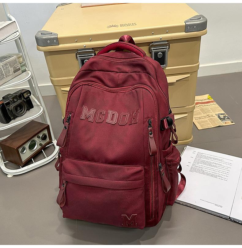 Schoolbag manufacturers wholesale backpack large capacity air cushion outdoor travel bag computer bag lightweight junior high school high school
