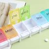 7-Day Portable Push-Button Pill Organizer with 7 Color-Coded Compartments