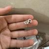 Grillz dentale a forma di cuore traforato placcato oro 18 carati, gioiello personalizzato per denti.