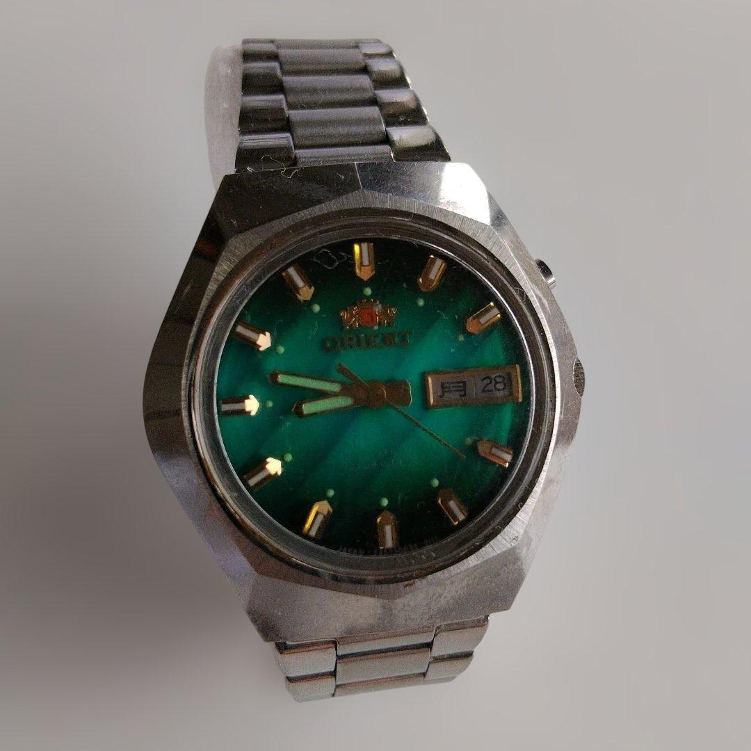 Used ORIENT automatic watch green dial