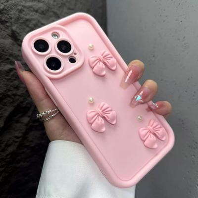 Funda para iPhone 15 14 13 Pro Max con diseño de lazo 3D y perlas, color rosa, resistente a golpes.