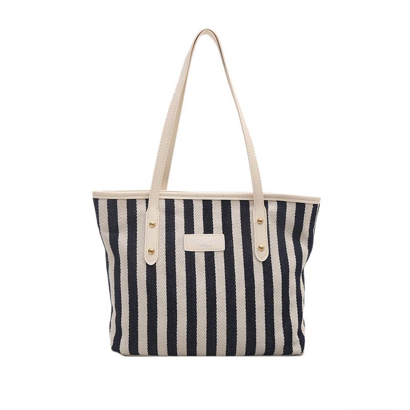

Korean version of retro literary handbag simple small fresh striped shoulder bag casual fashion large capacity shopping bag bag синий