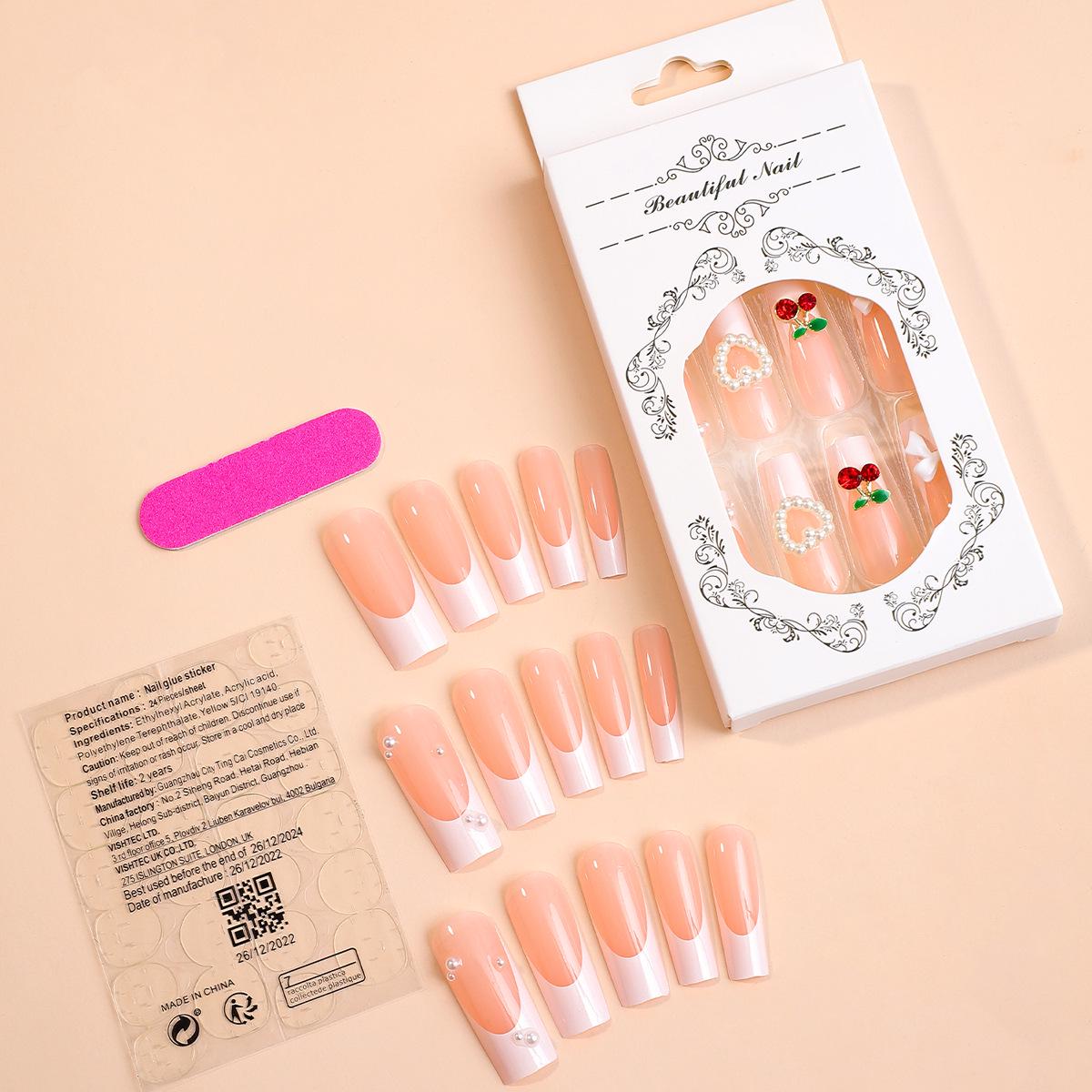 

Очень длинные ногти-пайпы со стразами, с вишневым бантом и жемчужным французским прямоугольным дизайном