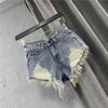 Vintage Low Rise Denim Shorts with Fringe & Ripped Pockets