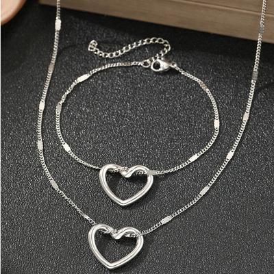 Set di gioielli da donna Twisted Heart Light Luxury Sense, in acciaio inossidabile, con collana e bracciale traforati per anniversario