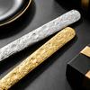 Gold-Plated Western Cutlery Set: Ice Crack Pattern Stainless Steel Fork, Knife, Spoon - Five Pieces.
