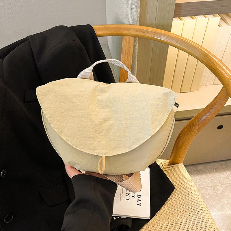 Crossbody bag new men's and women's sports crossbody bag flip cycling small backpack fashionable solid color breast bag