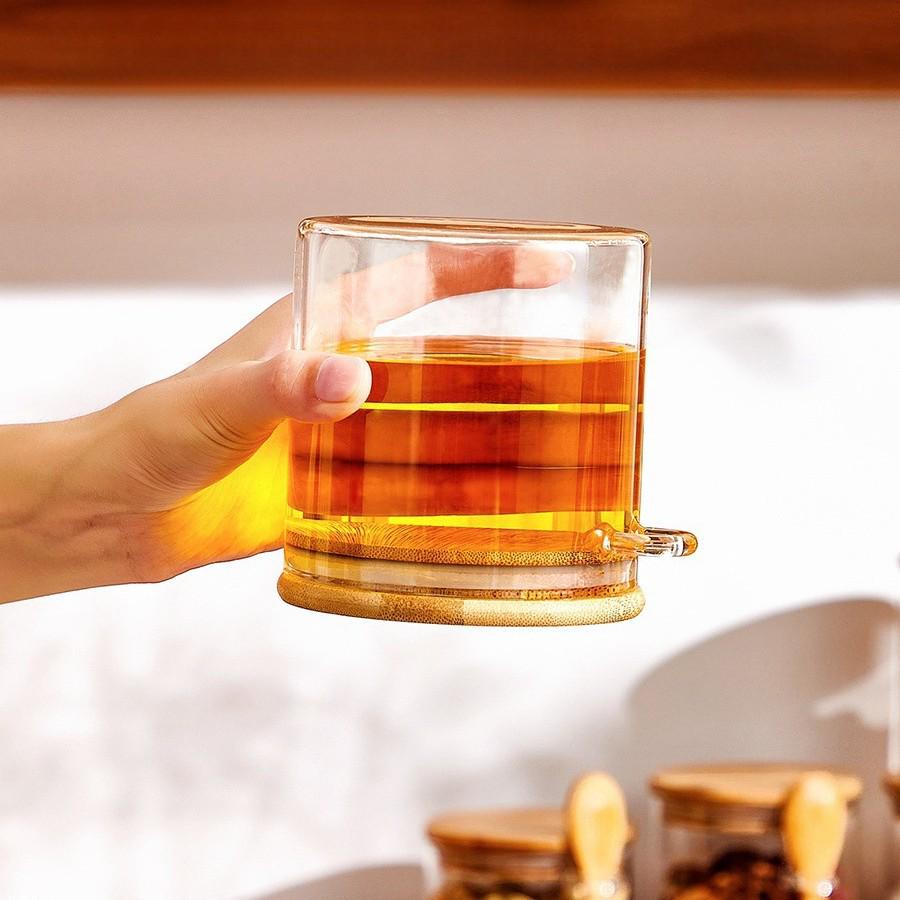 Round Glass Storage Jar with Spoon - High Borosilicate, Multi-purpose Transparent Sealed Container for Tea, Grains, or Flowers