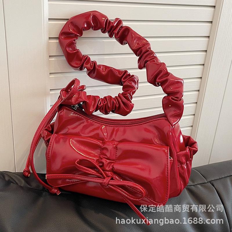 Bag women 2025 new design sense niche fashion messenger bag popular this year pleated armpit small square bag