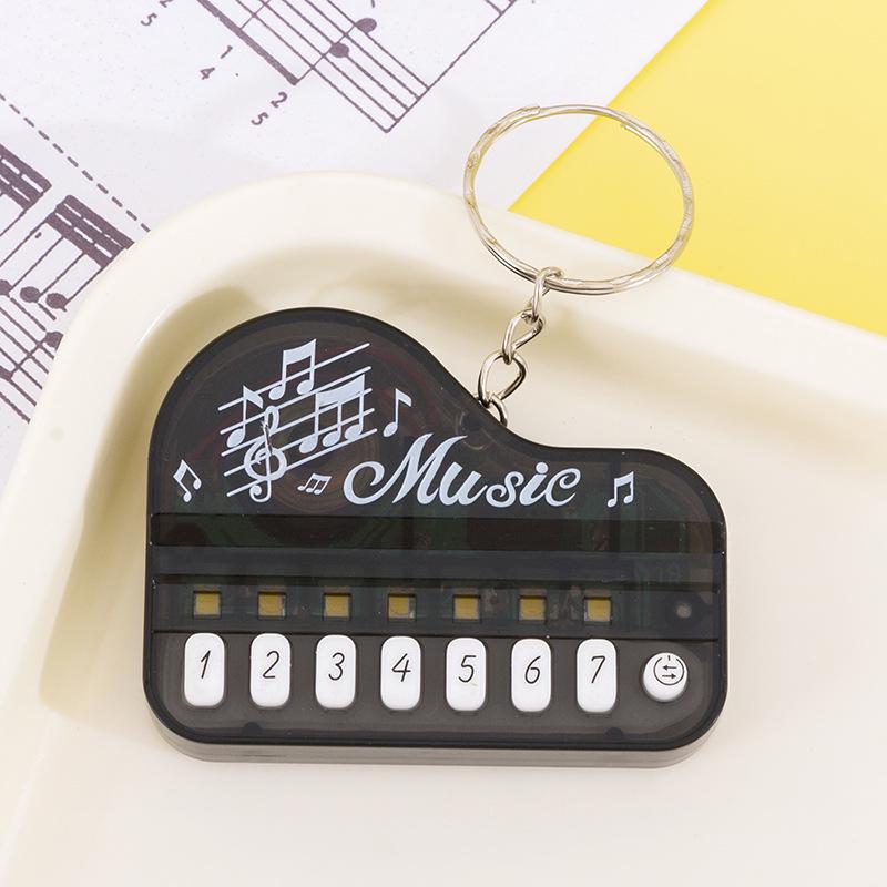 Mini Handheld Luminous Electronic Piano Keychain for Kids