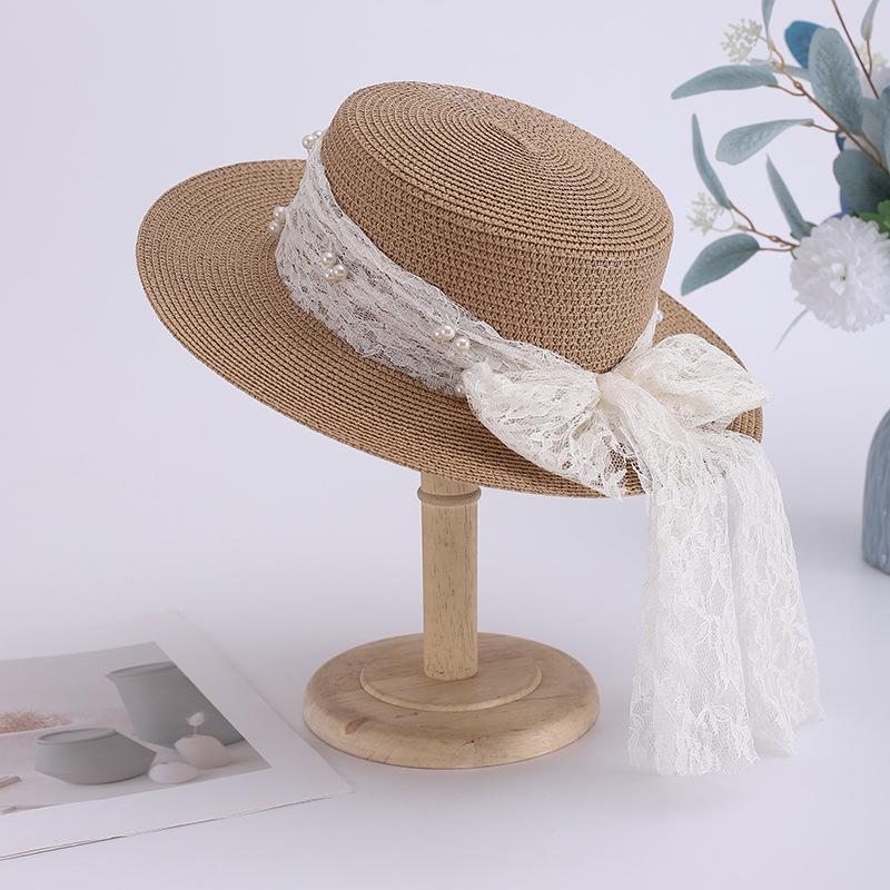 New embroidered lace streamer bow straw hat women's summer flat-brimmed sunscreen sun hat seaside big edge beach hat