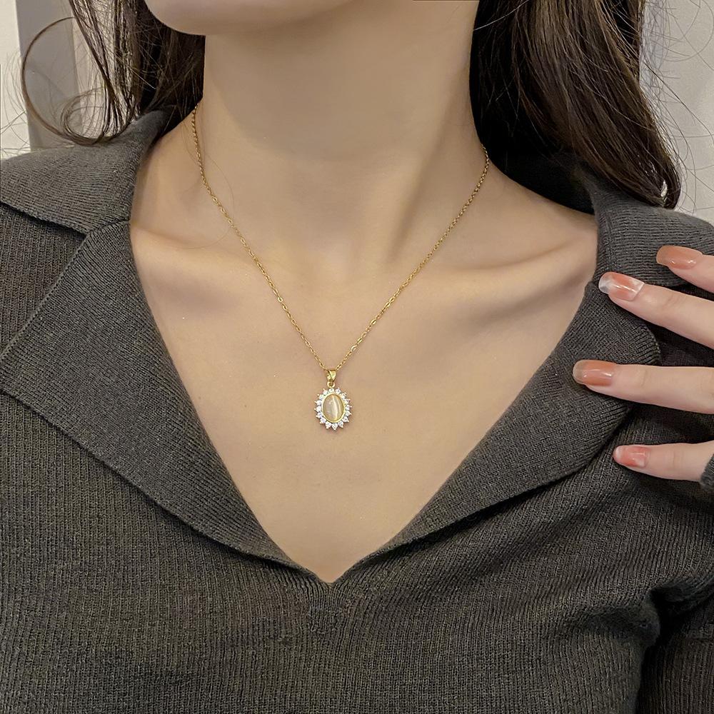 2026 Elegant Cat's Eye Stone Flower Necklace - Vintage Gold Plated Titanium Steel Zircon Halo Pendant for Women