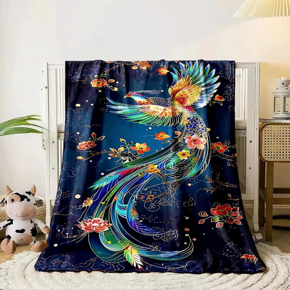 A vibrant phoenix with colorful feathers, surrounded by glowing flowers. for all seasons blanket lunch break throw gift 80cm x 120cm