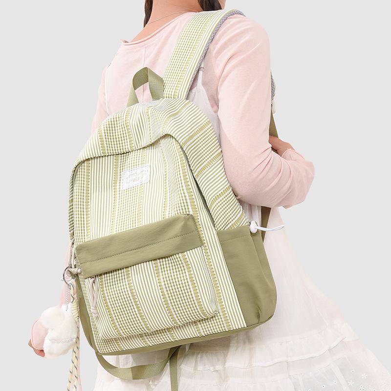 Schulrucksack1011 Frühling neu Japanisches Mädchen Herz karierter Rucksack leicht große Kapazität Schüler-Schulrucksack niedlicher Rucksack