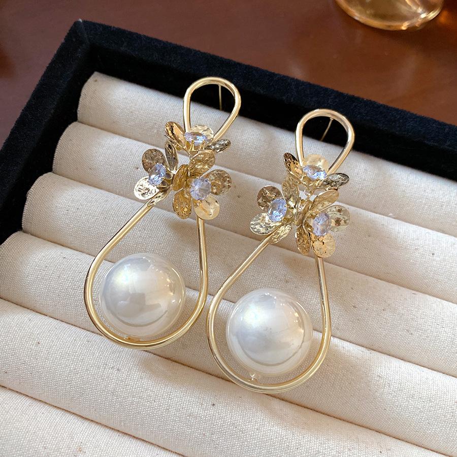 

Silver needle zircon flower pearl water drop pendant earrings light luxury fashion earrings women s personality earrings design sense niche