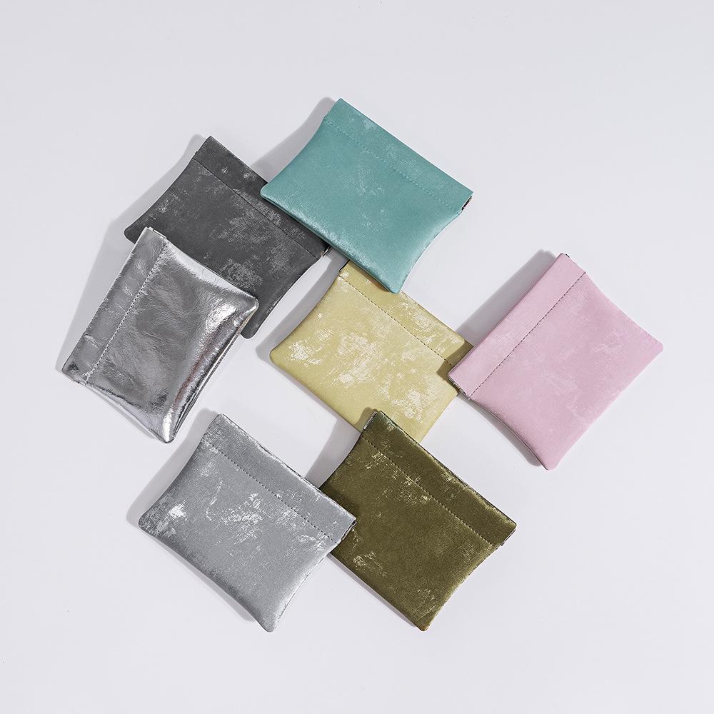 Ny kinesisk förvaringsväska, nationell stil satin kohud splitter myntväska, nya high-end läppstift hörlurar, äkta läder kortväska.