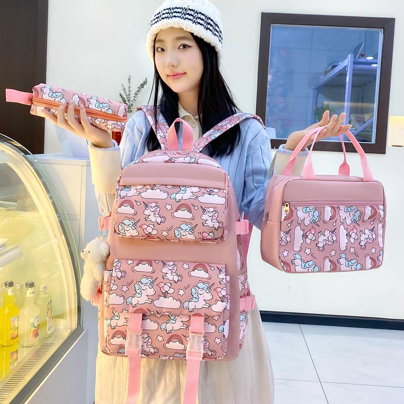 School bag new lightweight nylon backpack female cute cartoon three-piece set primary school students large-capacity school bag, fashionable