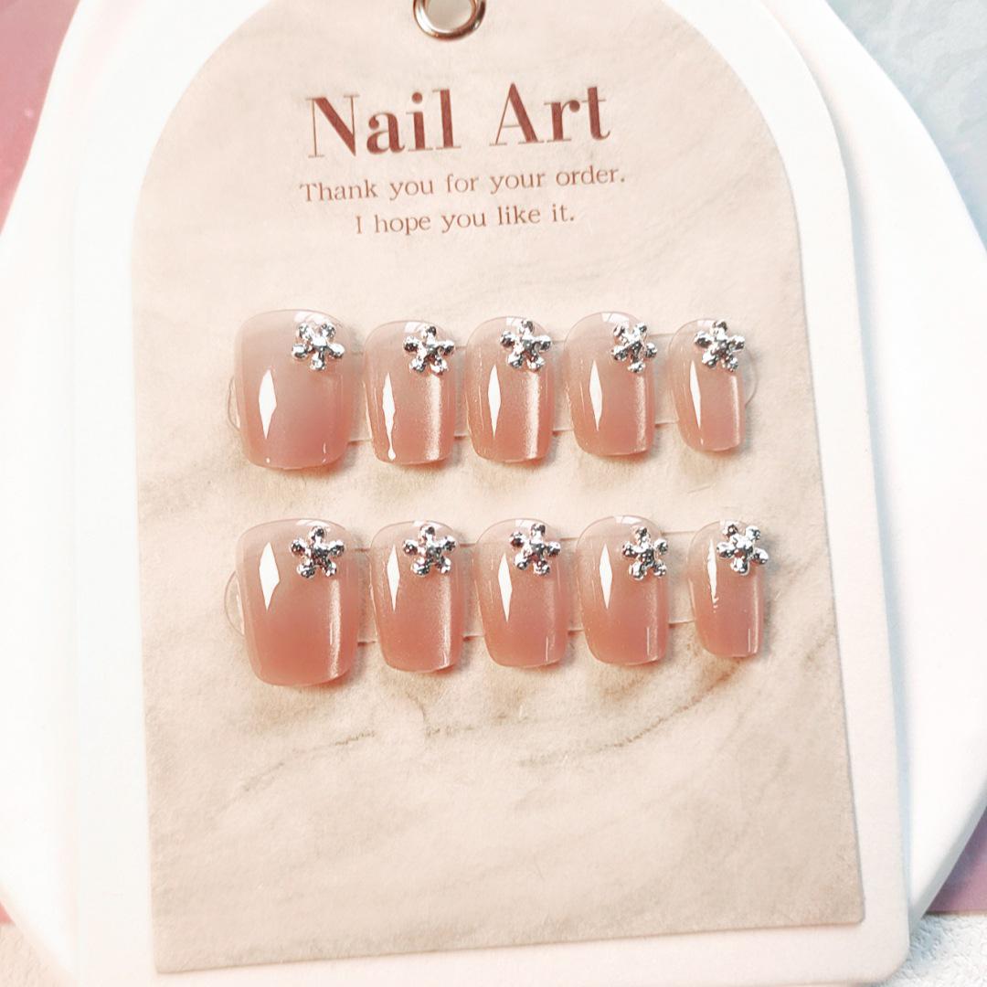

A696-Chasing Light: Cat Eye Photochromic Small Flower Fake Nails Glue Model