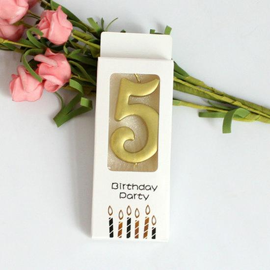 Gold Number Cake Candles for Birthday Celebrations - Party Decoration Arrangement.