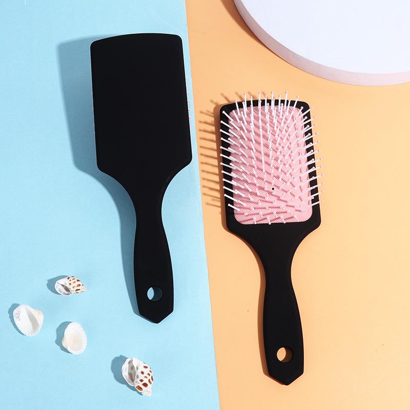 

Набор массажных расчесок с воздушной подушкой и распутывающих волосы: Завивай, укладывай и разглаживай широким гребнем-лопаткой 24 x 7 x 2.5 cm, 80g чёрный/розовый