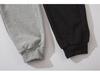 Funktionelle, einfarbige Unisex-Sport-Jogginghose mit Reißverschlusstaschen