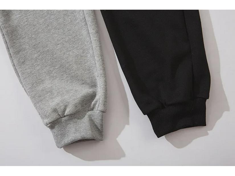Funktionelle, einfarbige Unisex-Sport-Jogginghose mit Reißverschlusstaschen