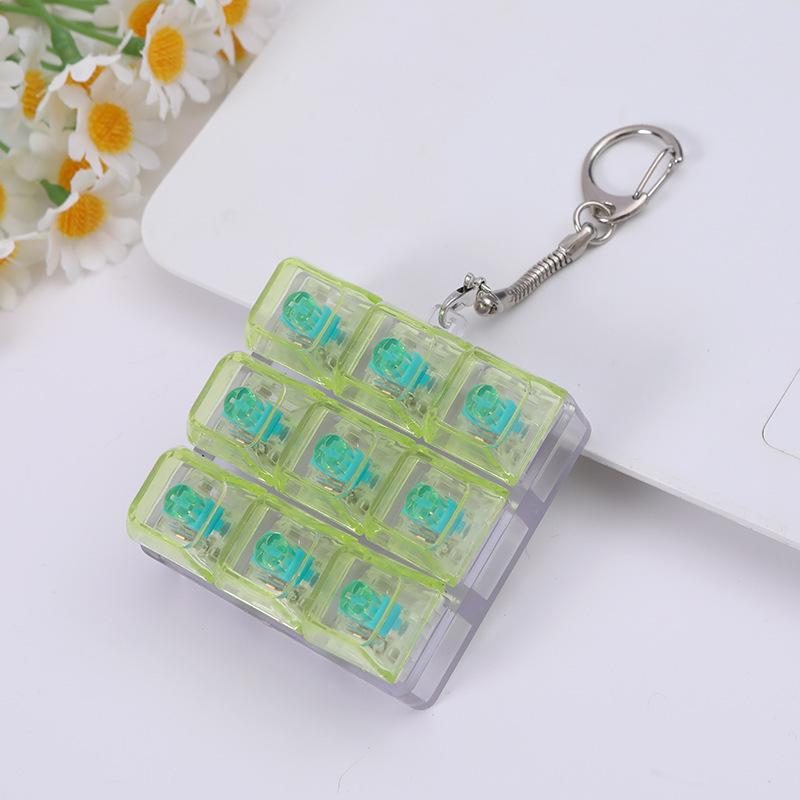 Transparent axis tester button decompression Keychain creative fingertip press luminous fingertip button toy decompression.